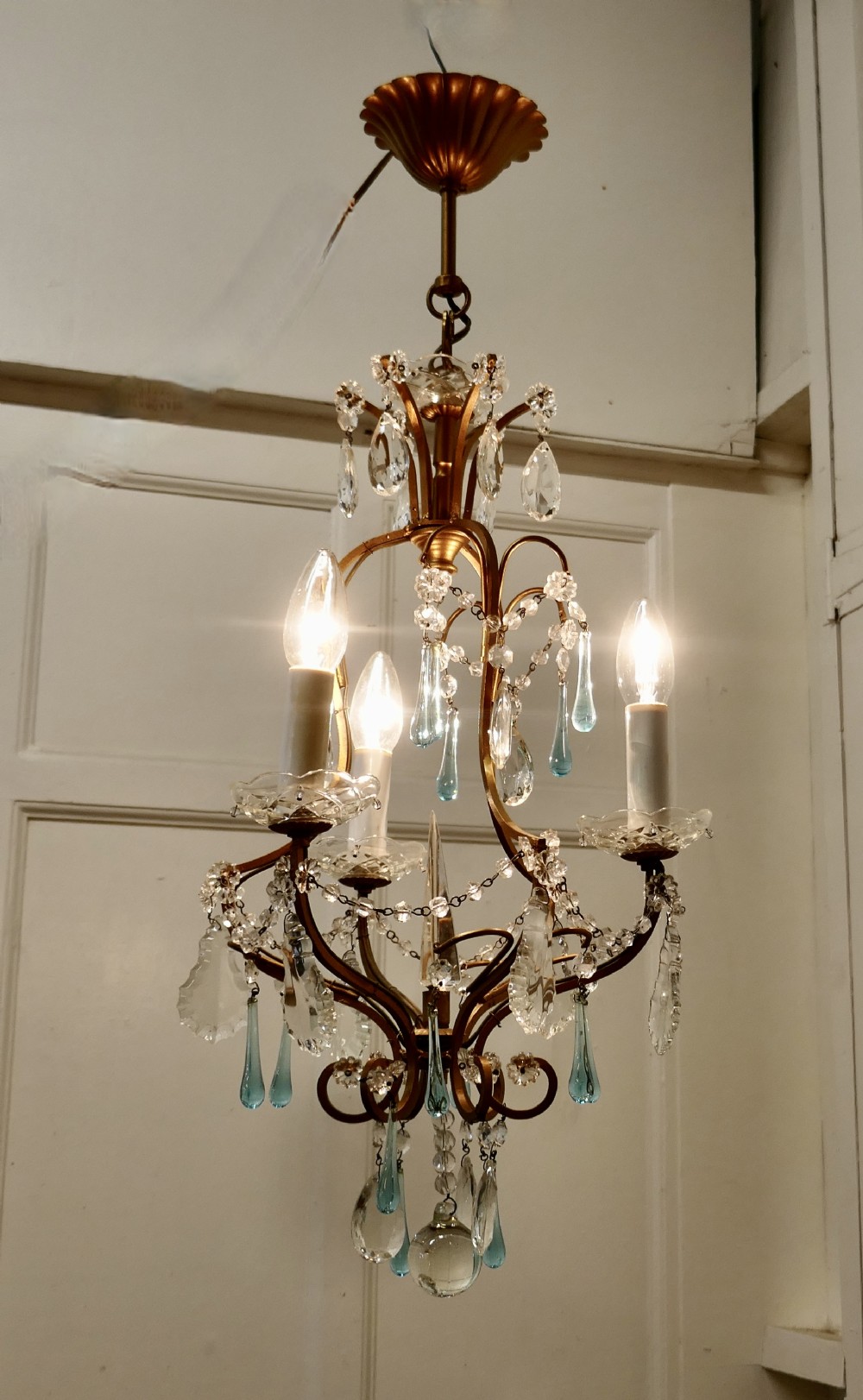 A Charming French Turquoise Crystal and Brass Chandelier
