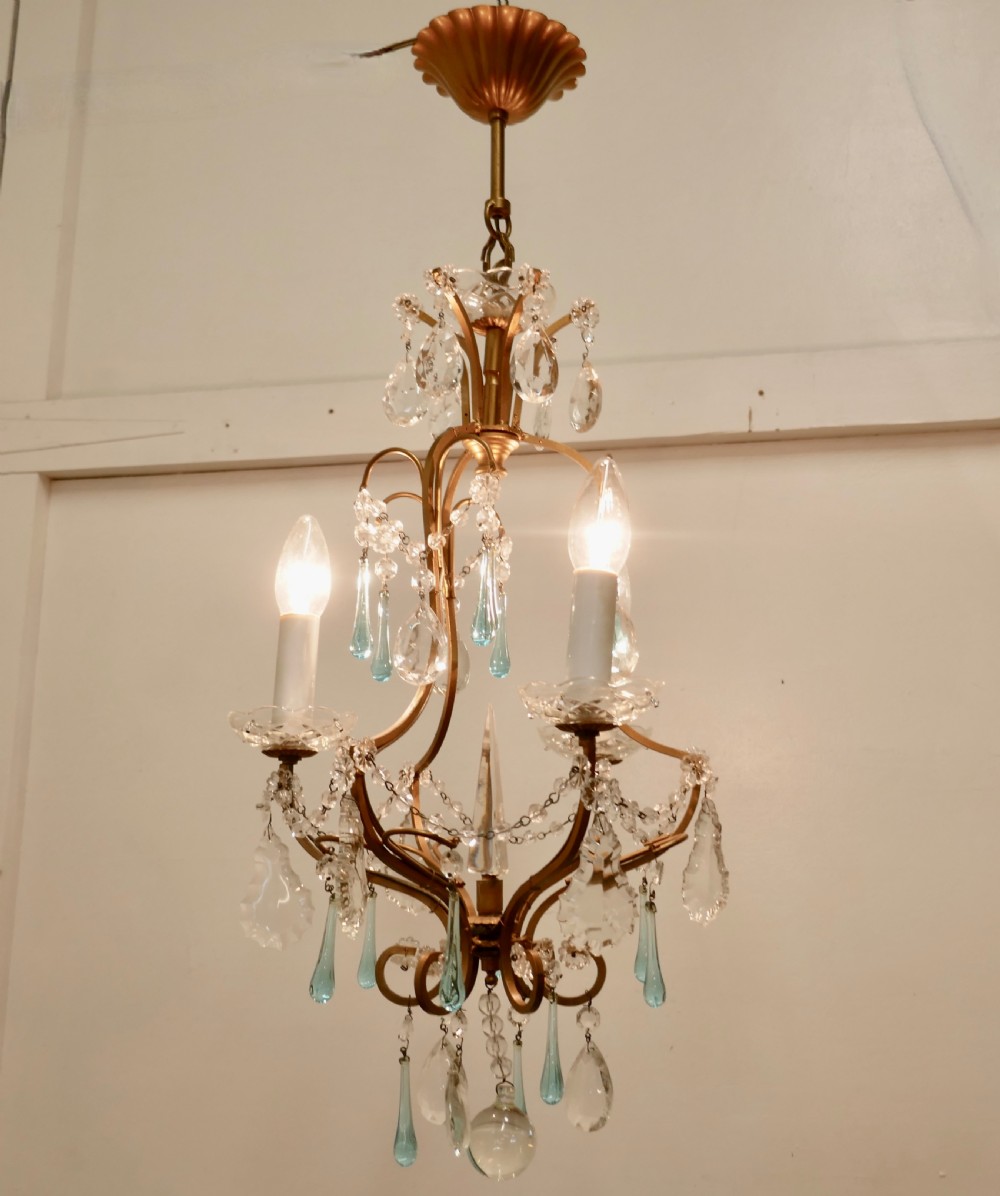 A Charming French Turquoise Crystal and Brass Chandelier View VII
