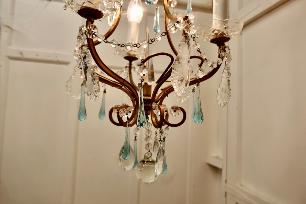 A Charming French Turquoise Crystal and Brass Chandelier View IX