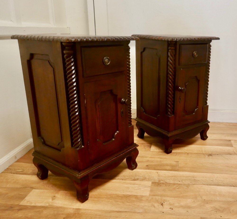A pair of French Mahogany Bedside Cupboards View II