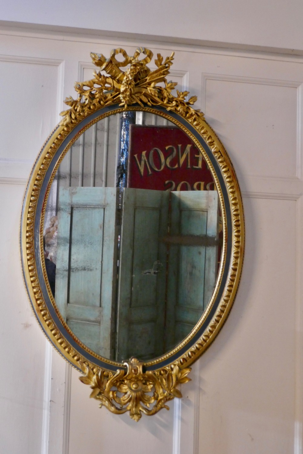A Large French Rococo Oval Gilt Wall Mirror View II