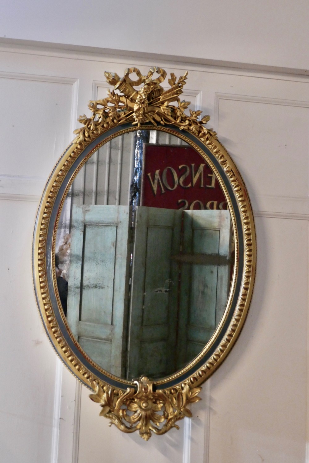 A Large French Rococo Oval Gilt Wall Mirror View III
