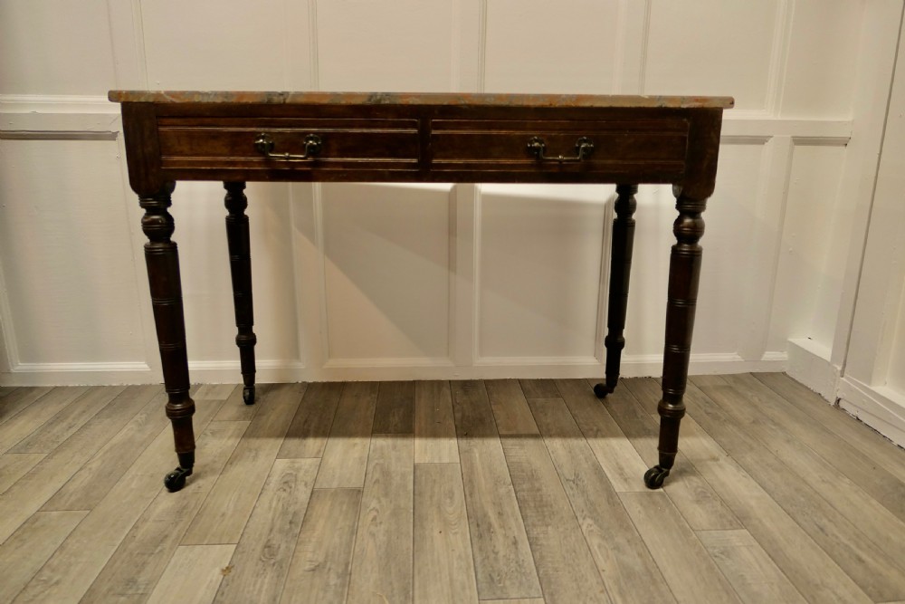 An Elegant Edwardian Pine Writing Table by Shoolbred