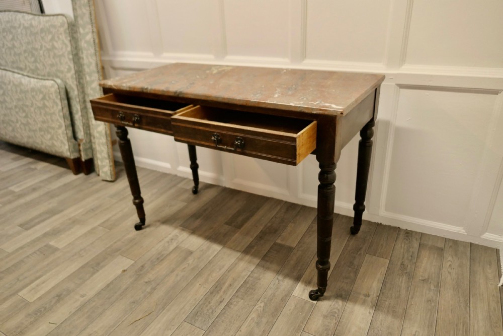 An Elegant Edwardian Pine Writing Table by Shoolbred View V