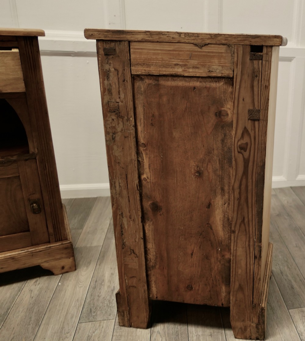 A Pair of Rustic Pine Bedside Cabinets with Brushing Slides View VII