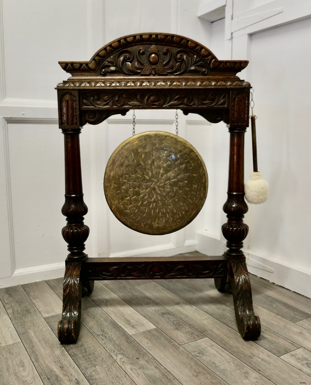 A Large Gothic Carved Oak and Brass Dinner Gong