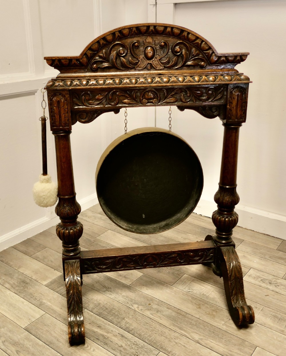 A Large Gothic Carved Oak and Brass Dinner Gong View IV
