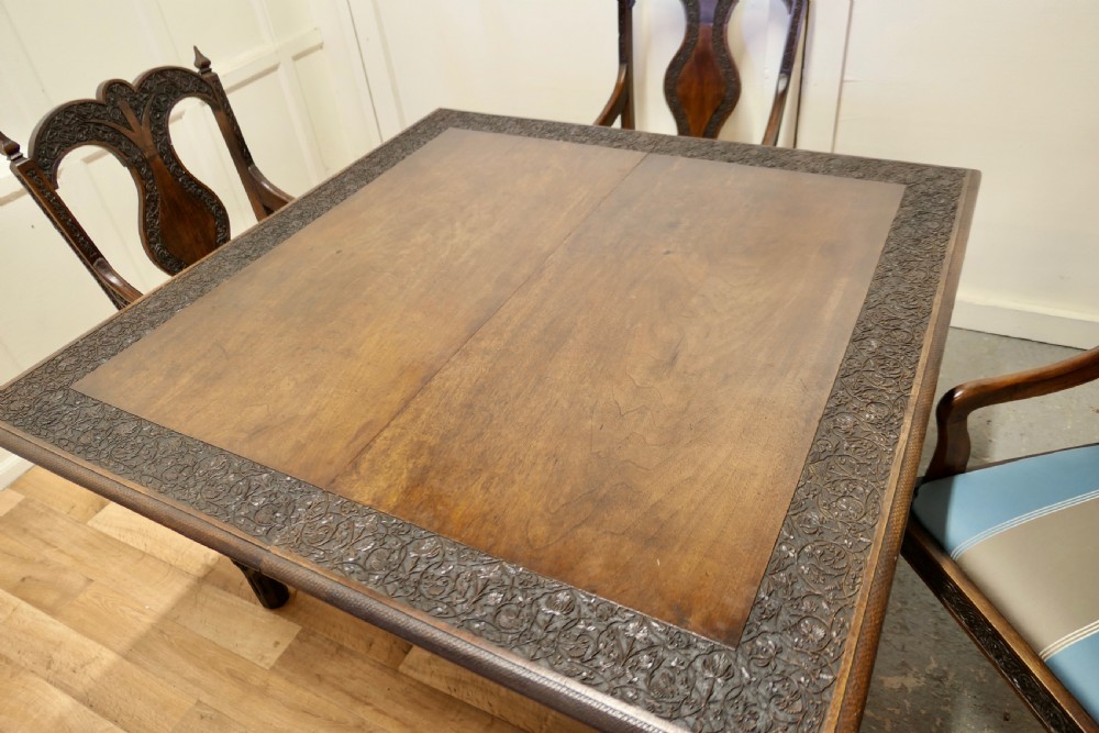 Carved Extending Table and 6 Matching Carver Chairs View X