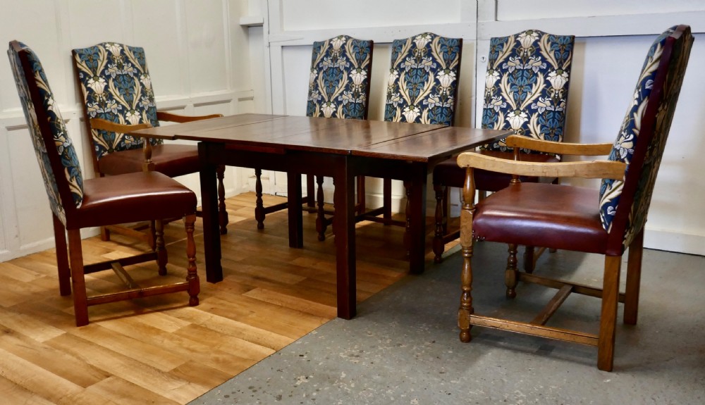 A Set of Eight Arts & Crafts Golden Oak Dining Chairs  View X