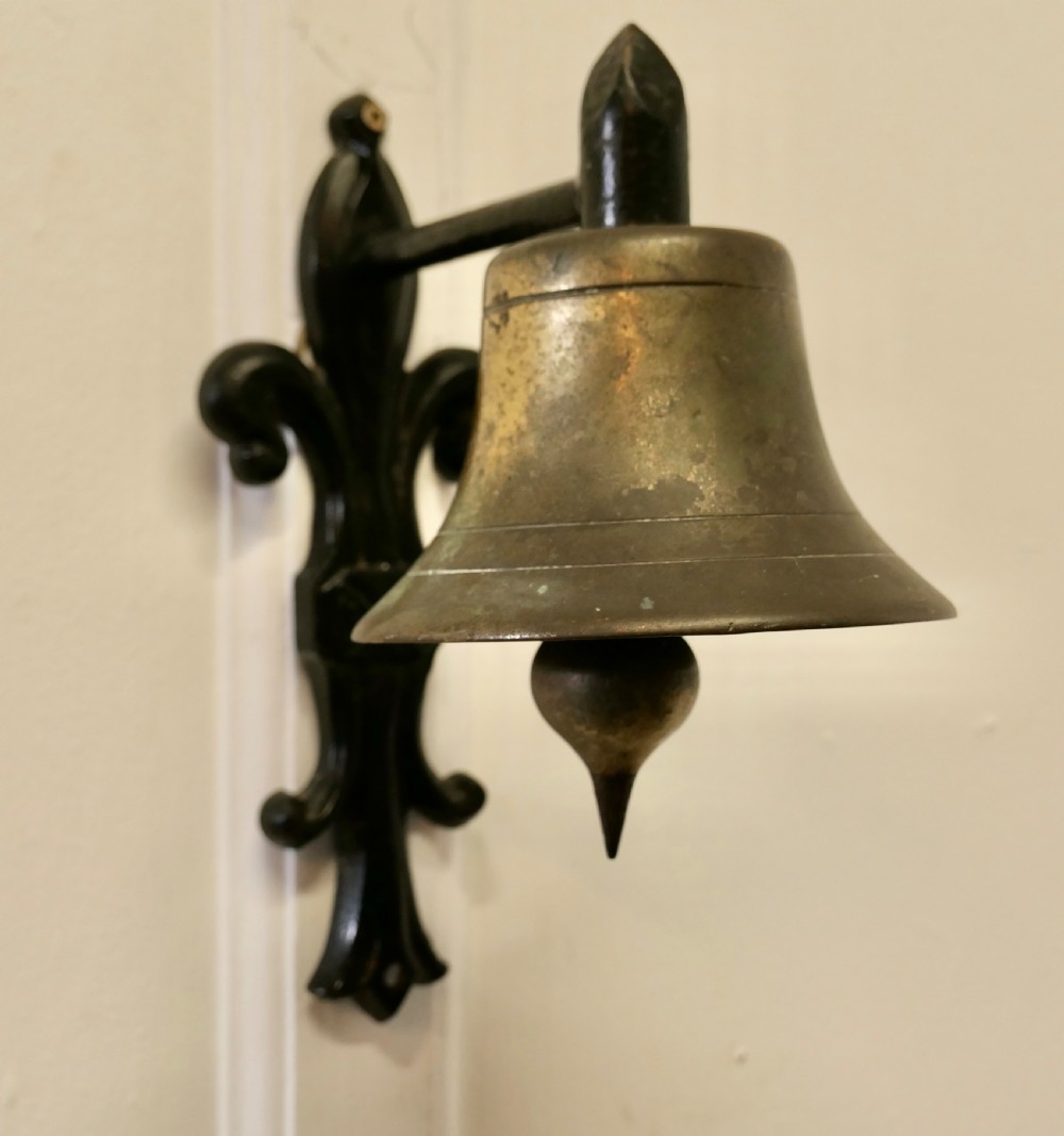 Brass Bell on a Cast Iron Bracket