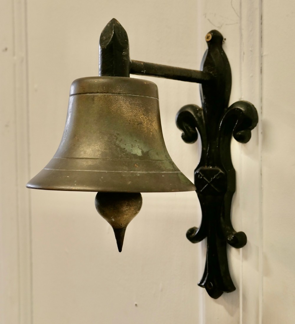 Brass Bell on a Cast Iron Bracket View IV