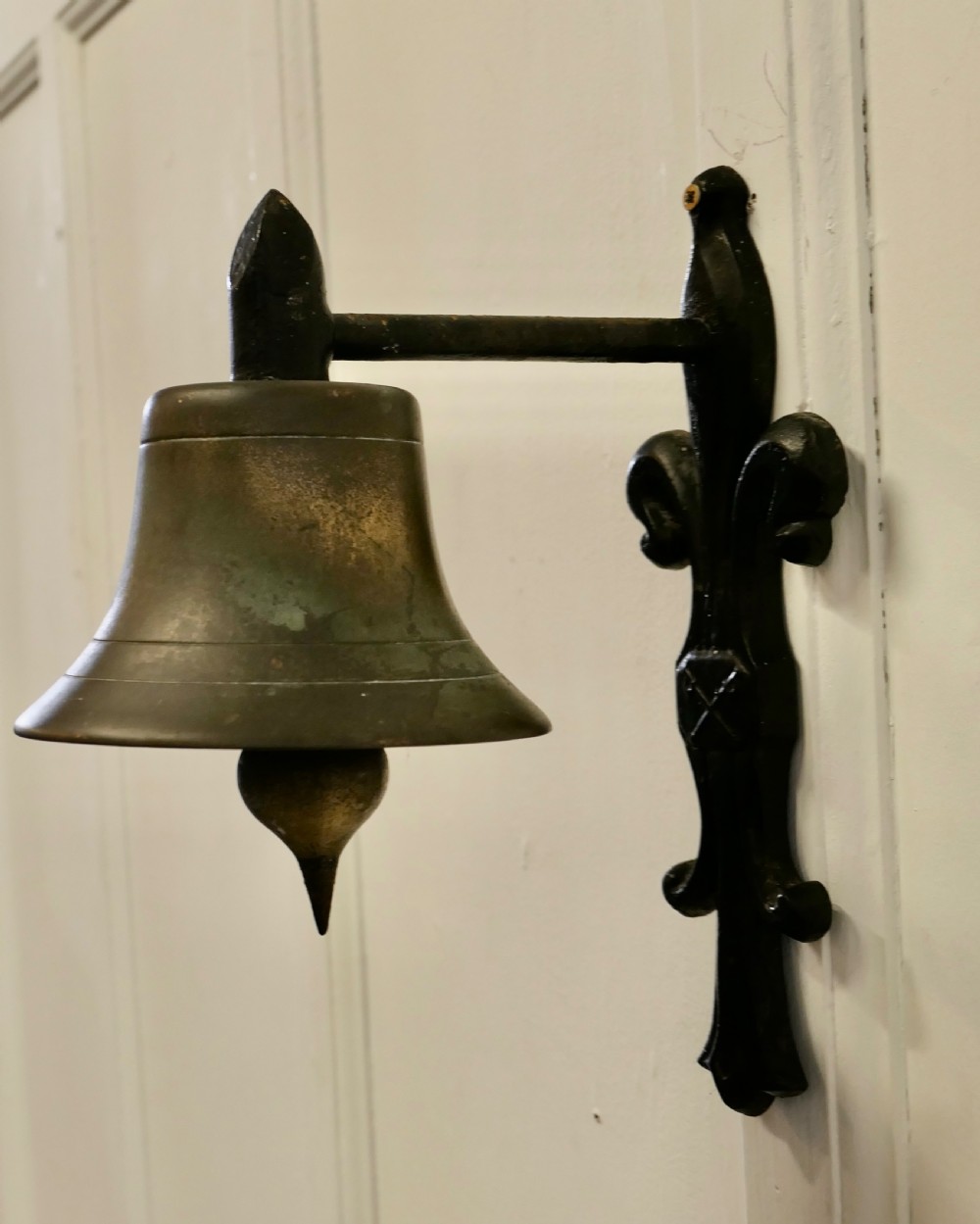 Brass Bell on a Cast Iron Bracket View V