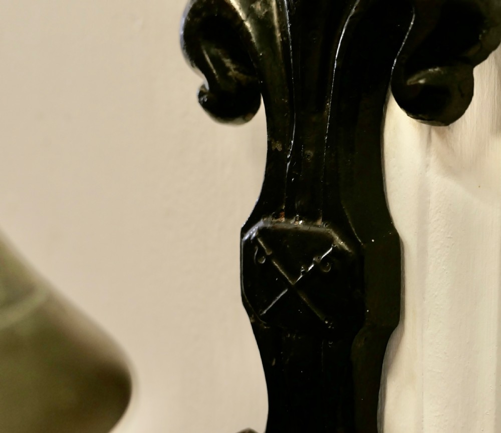 Brass Bell on a Cast Iron Bracket View VI