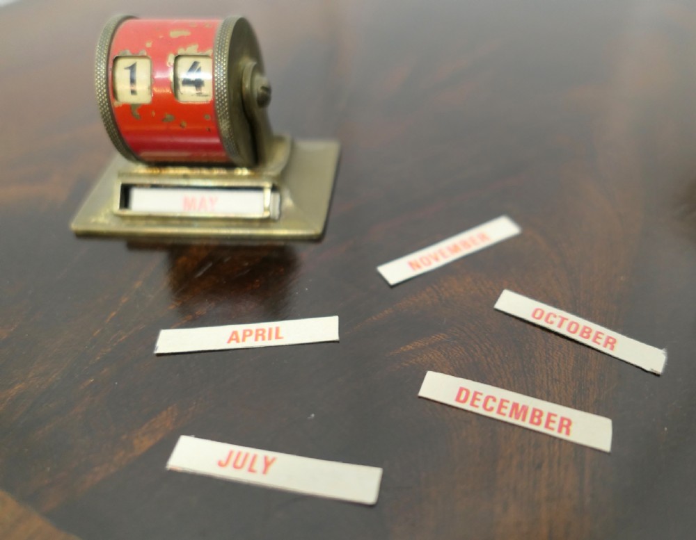 A Superb Painted Brass Perpetual Desk Calendar  View IV