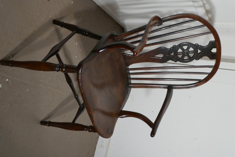 An Early 19th Elm Wheel Back Carver Chair View III