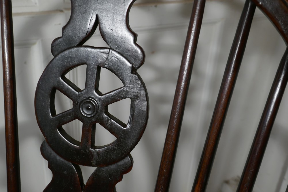 An Early 19th Elm Wheel Back Carver Chair View IV