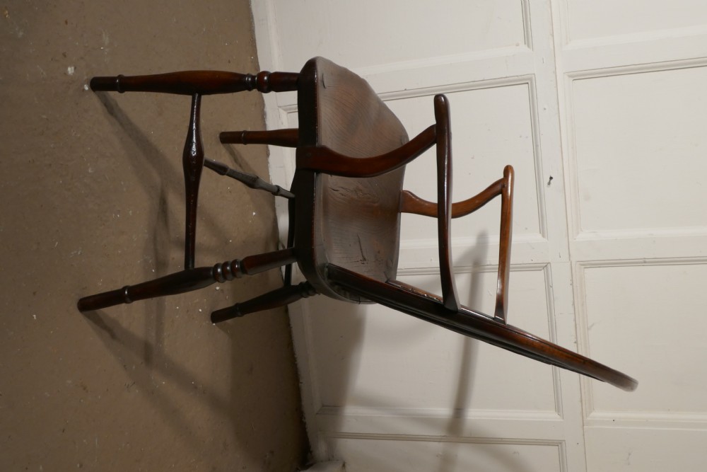 An Early 19th Elm Wheel Back Carver Chair View V