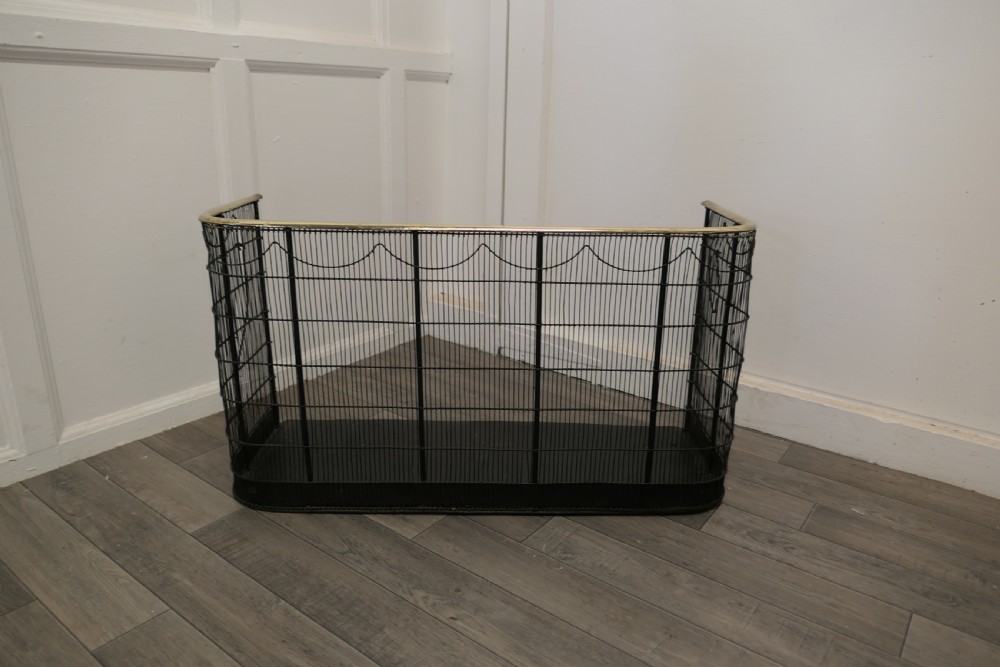 A Georgian Brass and Iron Club Fender or Nursery Fire Guard