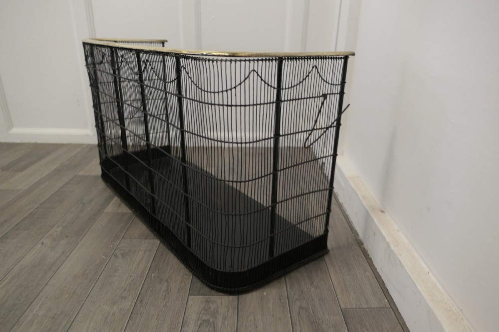 A Georgian Brass and Iron Club Fender or Nursery Fire Guard View III