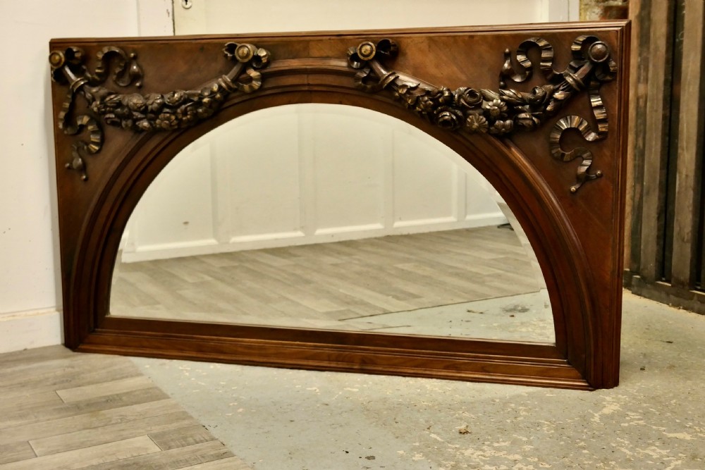 A Superb Large Carved Walnut Overmantel Mirror  