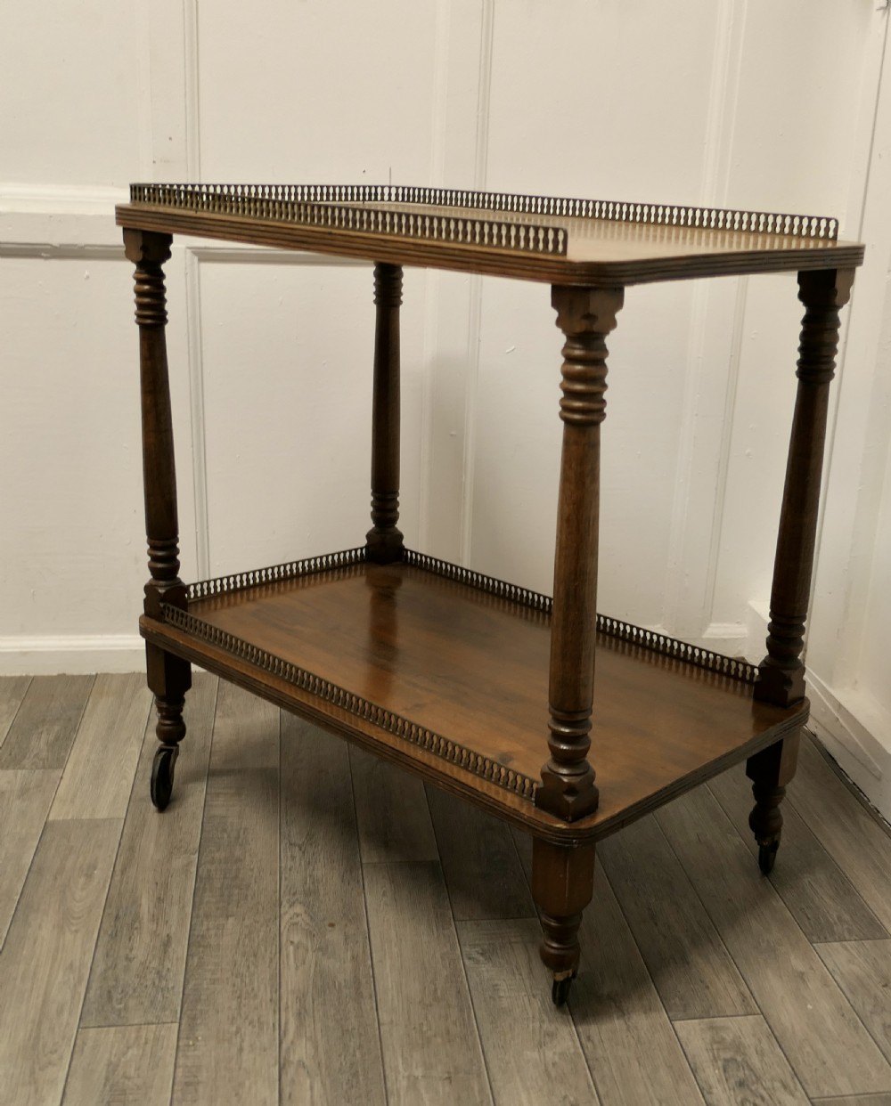 A Superb Walnut 2 Tier Tea Trolley, with Brass Galleries 
