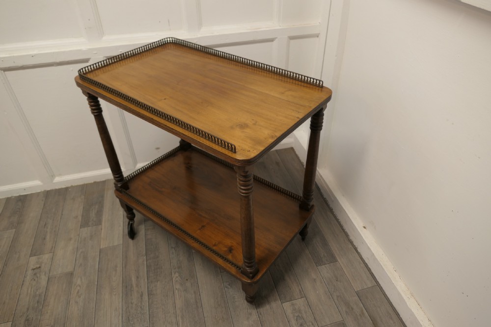 A Superb Walnut 2 Tier Tea Trolley, with Brass Galleries  View II