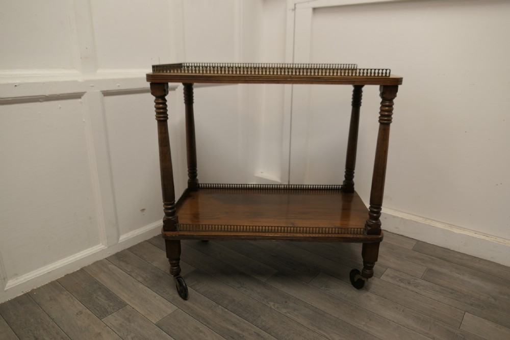 A Superb Walnut 2 Tier Tea Trolley, with Brass Galleries  View III