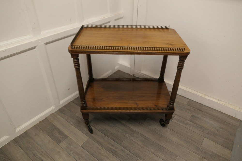 A Superb Walnut 2 Tier Tea Trolley, with Brass Galleries  View V