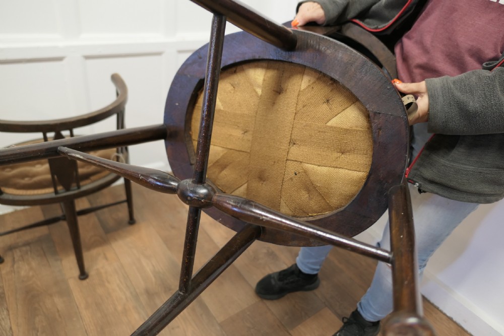 A pair of Edwardian Circular Arm Chairs View VIII