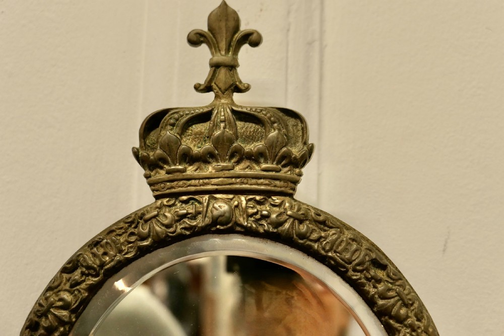 A Pair of Round Brass Girandole Wall Mirrors, in a Regal Design View VI