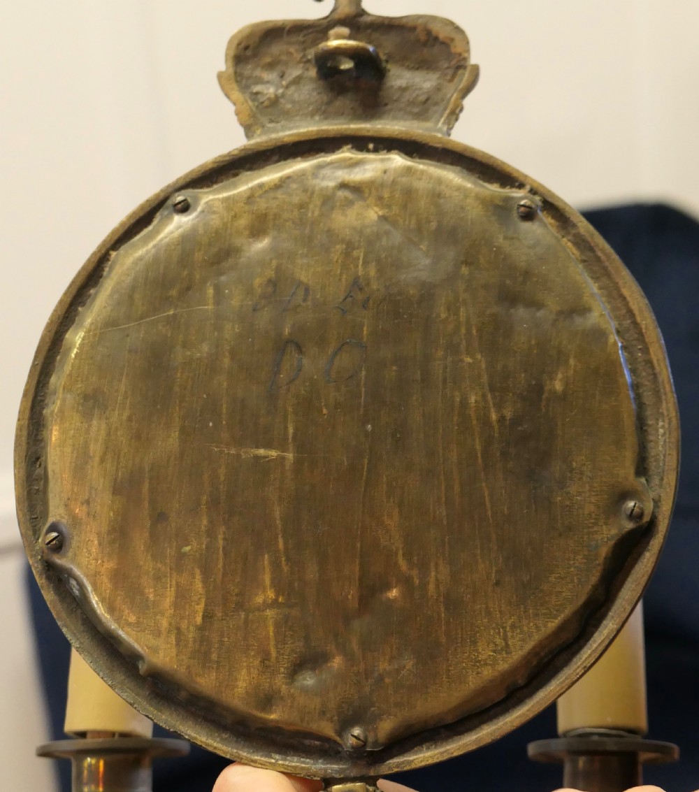 A Pair of Round Brass Girandole Wall Mirrors, in a Regal Design View VII
