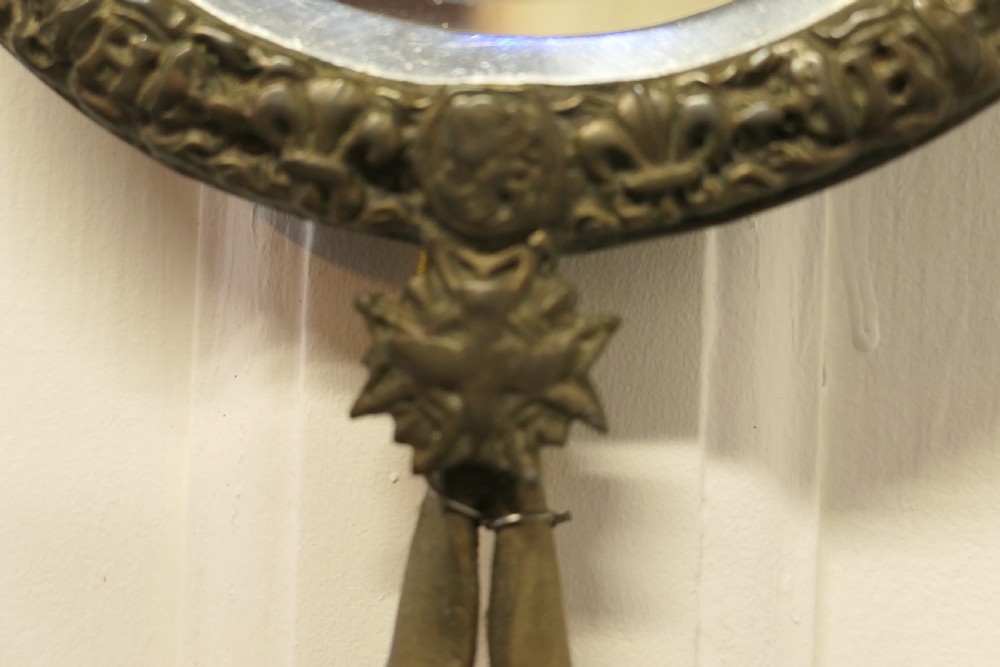 A Pair of Round Brass Girandole Wall Mirrors, in a Regal Design View VIII