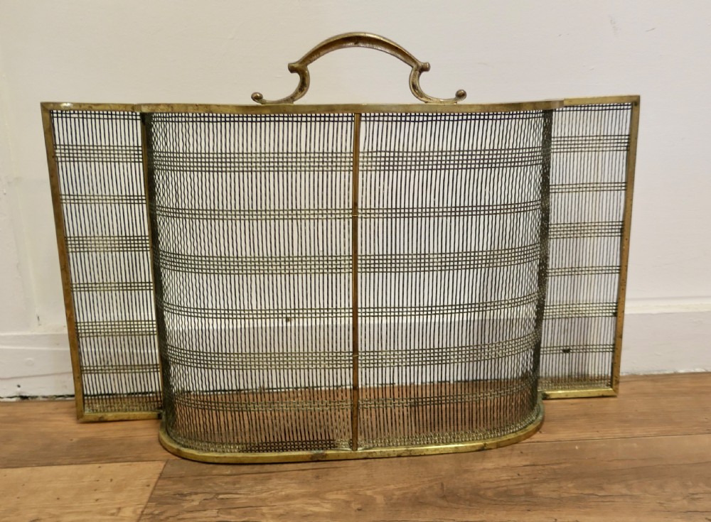 A Victorian Bowed Brass  Fire Guard