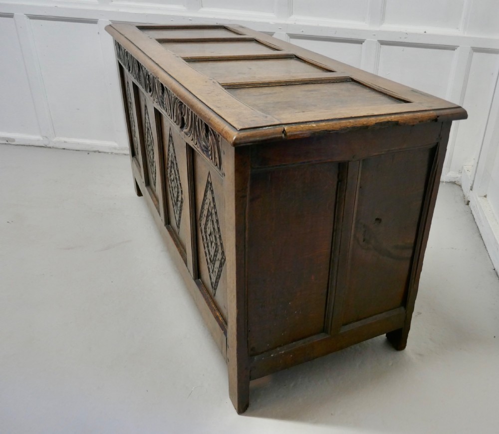 A Large 17th Century  Carved Oak Coffer  View II