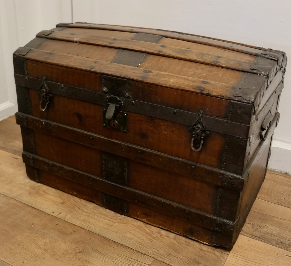 A Large Polished Oak and Pine Dome Top Chest  