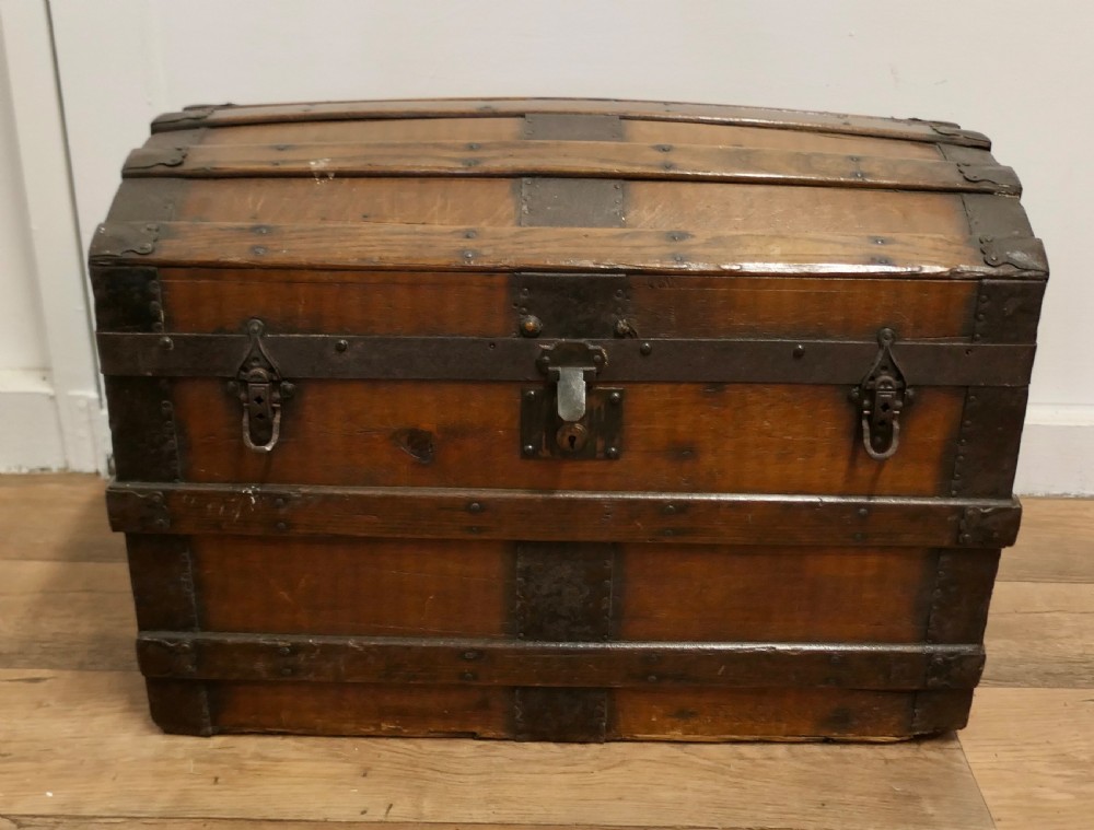 A Large Polished Oak and Pine Dome Top Chest   View II