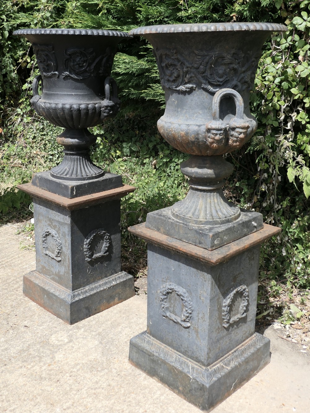 A Pair of Large Cast Iron Urns, Garden Planters on Plinths View III