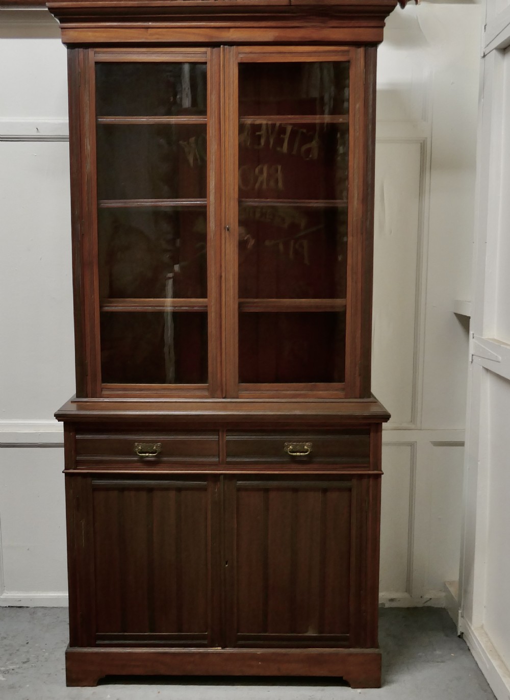 An Edwardian Walnut Bookcase