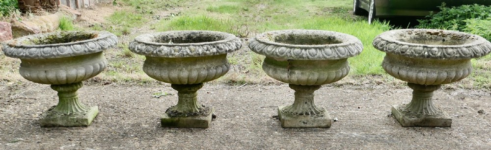 Set of 4 Large Weathered Cast Stone Garden Urns Planters