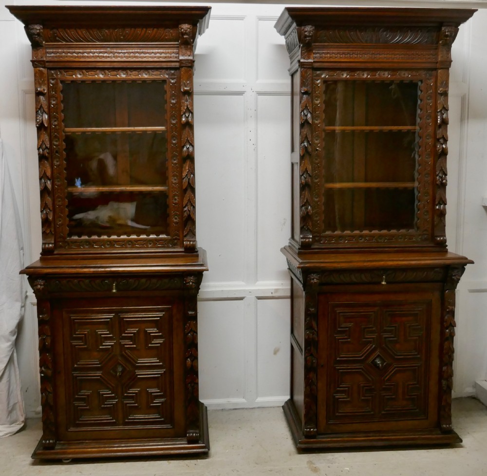 A Pair of French Carved Gothic Oak Bookcases