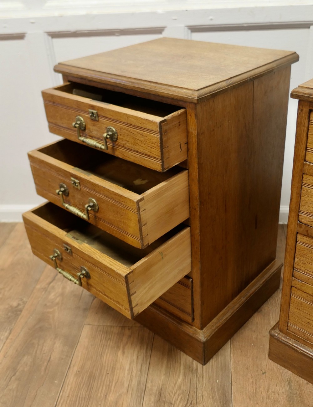 A Pair of Arts and Crafts 4 Drawer Chest of Drawers, Night Tables View V