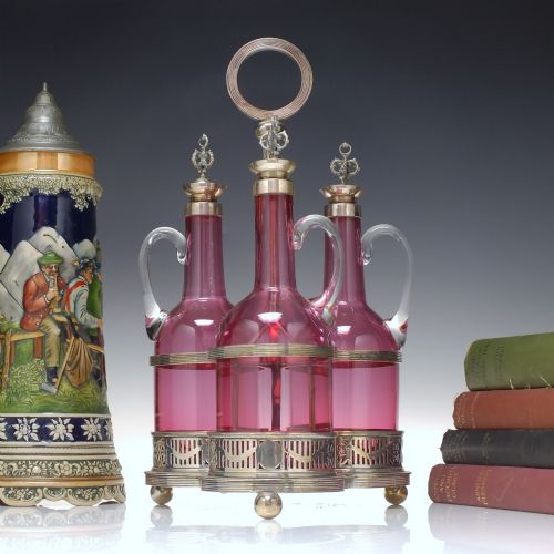 THREE VICTORIAN GLASS CRANBERRY CLARET JUGS DECANTERS IN SILVER PLATED FRAME 1880 - ADDITIONAL PHOTO 1