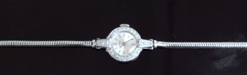 fig 5. VERY PRETTY PLATINUM AND DIAMOND LONGINES LADIES COCKTAIL WATCH C1950