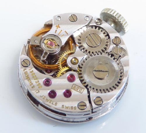 fig 6. VERY PRETTY PLATINUM AND DIAMOND LONGINES LADIES COCKTAIL WATCH C1950
