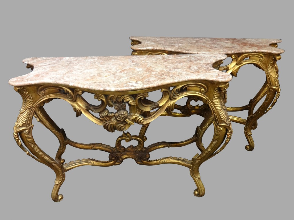 A Good Pair of Large Gilt Marble Topped Console Tables