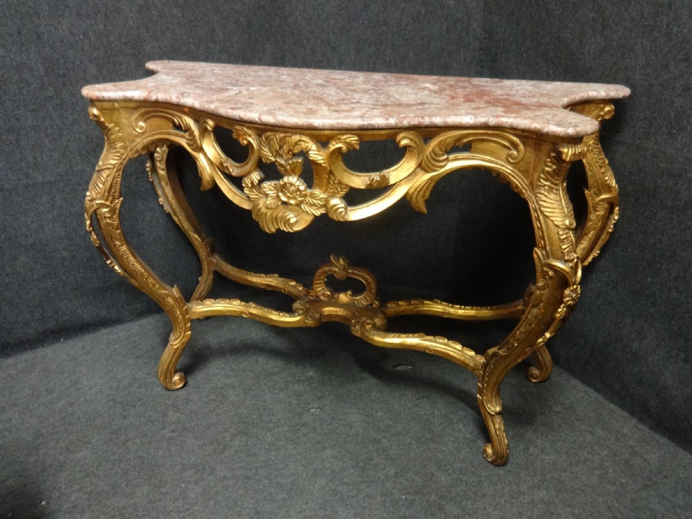 A Good Pair of Large Gilt Marble Topped Console Tables View II