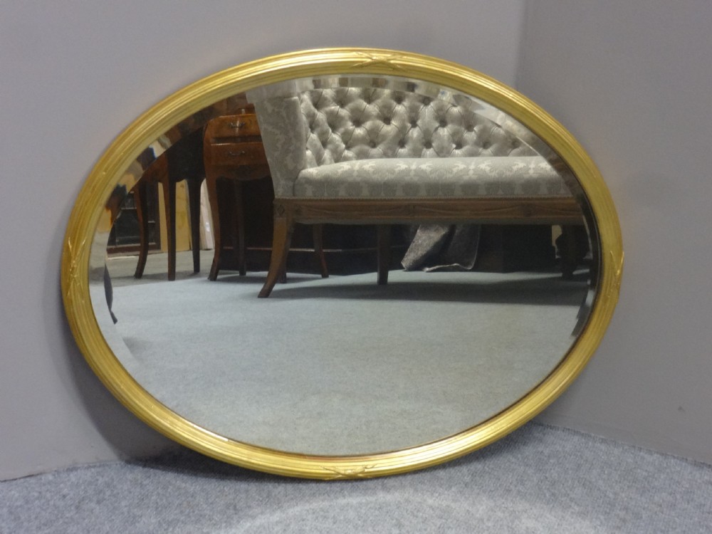 Good English Victorian Oval Gilt Mirror View V