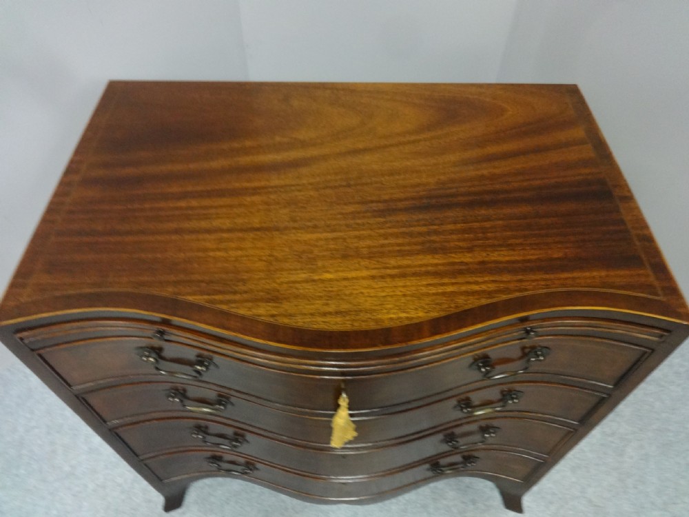 Great Serpentine Inlaid Mahogany Chest of Drawers View III