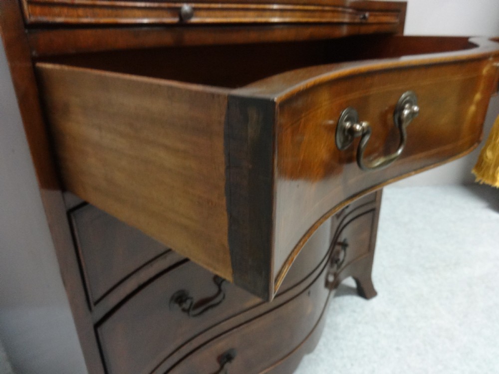 Great Serpentine Inlaid Mahogany Chest of Drawers View V