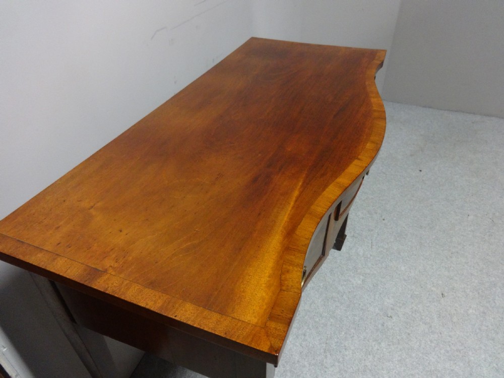Good Mahogany Serpentine Side Table View VII